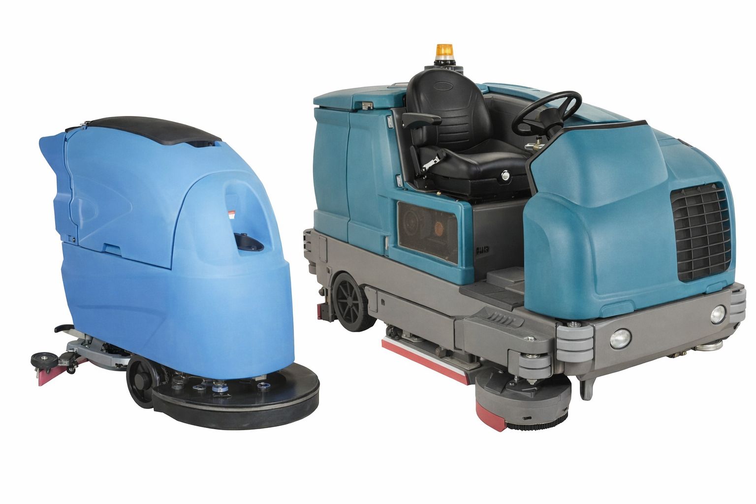 Två professionella skurmaskiner, en gå-bakom och en åkbar modell.